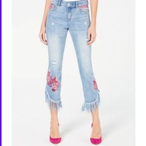 Embroidered cropped fringe jeans